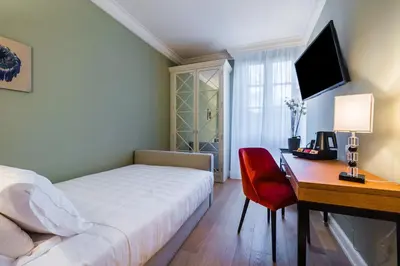 Letto o letti in una camera di Villa Neroli - Place of Charme