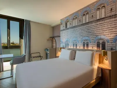 Letto o letti in una camera di B&B Hotel Firenze City Center