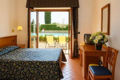 Letto o letti in una camera di Hotel Villa Dei Bosconi