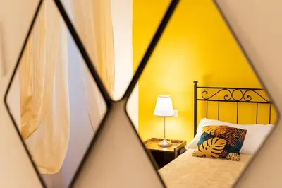 Letto o letti in una camera di Signoria - Flo Apartments