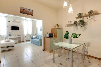 TV o dispositivi per l'intrattenimento presso Charlize Apartment by Mamo Florence