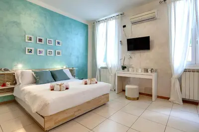 TV o dispositivi per l'intrattenimento presso Charlize Apartment by Mamo Florence