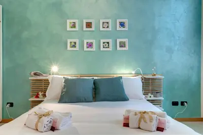 Letto o letti in una camera di Charlize Apartment by Mamo Florence