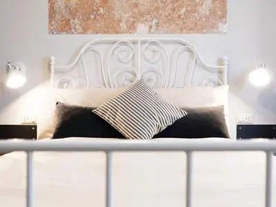 Letto o letti in una camera di Domus 19