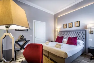 Letto o letti in una camera di Hotel Emma Small Luxury Hotel
