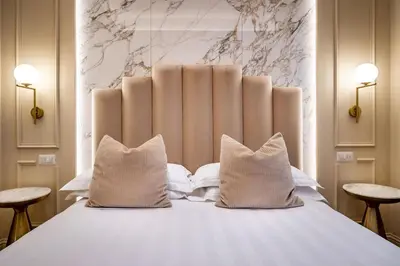 Letto o letti in una camera di Hotel Emma Small Luxury Hotel