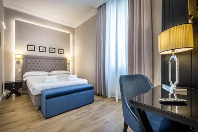 Letto o letti in una camera di Hotel Emma Small Luxury Hotel