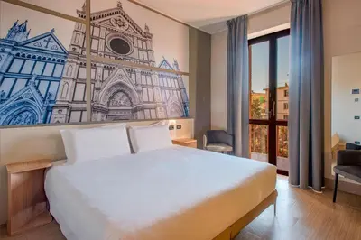 Letto o letti in una camera di B&B Hotel Firenze Nuovo Palazzo Di Giustizia
