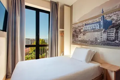 Letto o letti in una camera di B&B Hotel Firenze Nuovo Palazzo Di Giustizia