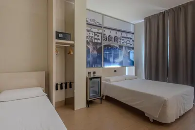 Letto o letti in una camera di B&B Hotel Firenze Nuovo Palazzo Di Giustizia