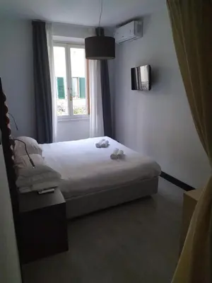 Letto o letti in una camera di The One Firenze