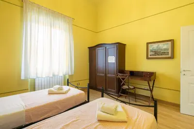 Letto o letti in una camera di Appartamenti degli Artisti by Mmega