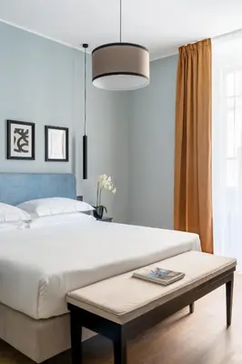Letto o letti in una camera di Flom Boutique Hotel