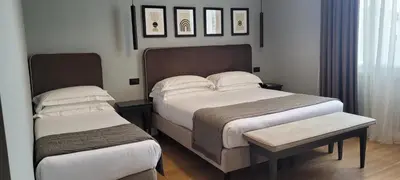 Letto o letti in una camera di Flom Boutique Hotel