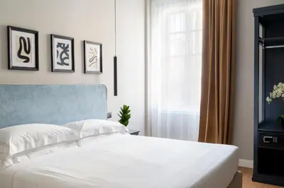 Letto o letti in una camera di Flom Boutique Hotel