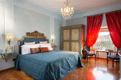 Letto o letti in una camera di Hotel Principe