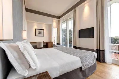 Letto o letti in una camera di Hotel Orto de' Medici