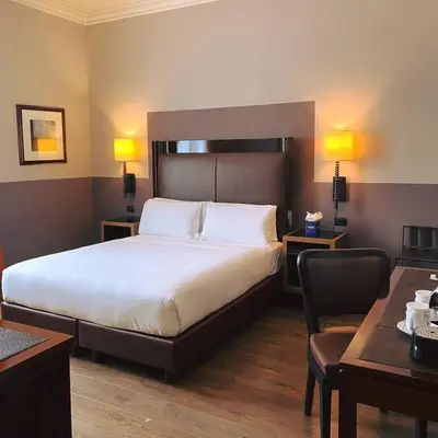 Letto o letti in una camera di Allegroitalia San Gallo Firenze