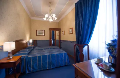 Letto o letti in una camera di Diana Park Hotel