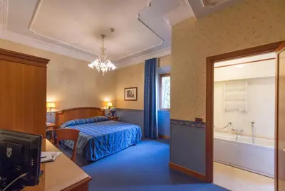 Letto o letti in una camera di Diana Park Hotel