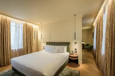 Letto o letti in una camera di Palazzo Montebello