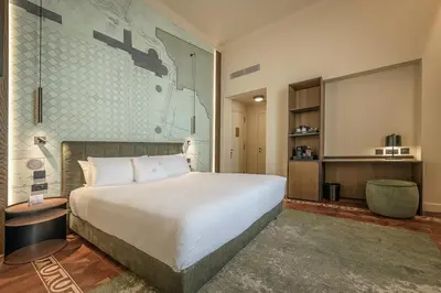 Letto o letti in una camera di Palazzo Montebello