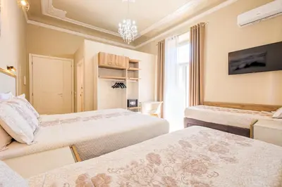 Letto o letti in una camera di Hotel Bijou Roof Terrace