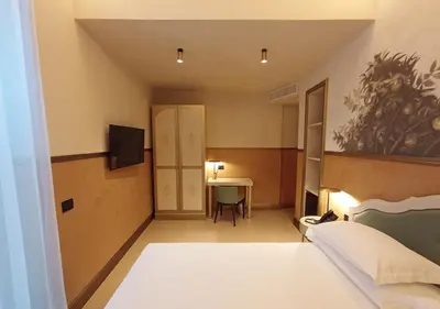 Letto o letti in una camera di Hotel Palazzo Ognissanti