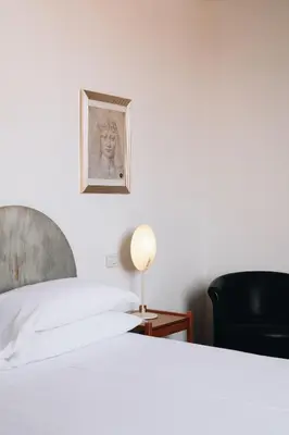 Letto o letti in una camera di Hotel Palazzo Ognissanti