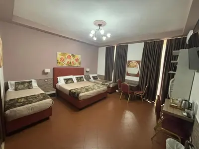 Letto o letti in una camera di Hotel Ester