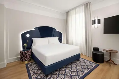 Letto o letti in una camera di Anglo American Hotel Florence, Curio Collection By Hilton