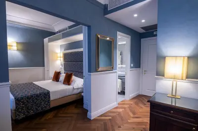 Letto o letti in una camera di Rivoli Boutique Hotel