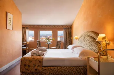 Letto o letti in una camera di Grand Hotel Adriatico