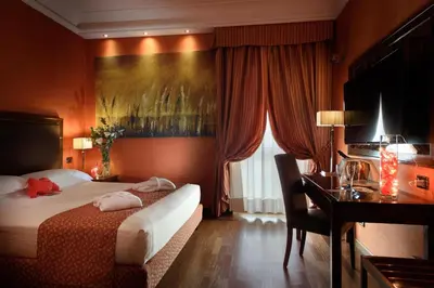 Letto o letti in una camera di Grand Hotel Adriatico