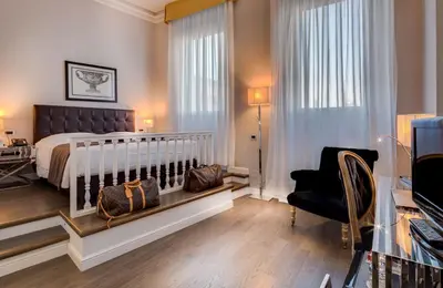 Letto o letti in una camera di Hotel Roma