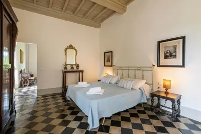 Letto o letti in una camera di Villa Poggio Cherici by Mmega