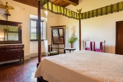 Letto o letti in una camera di Villa Poggio Cherici by Mmega