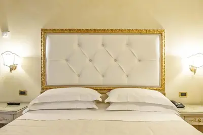 Letto o letti in una camera di Hotel Alba Palace