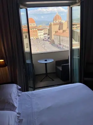 Letto o letti in una camera di c-hotels Ambasciatori