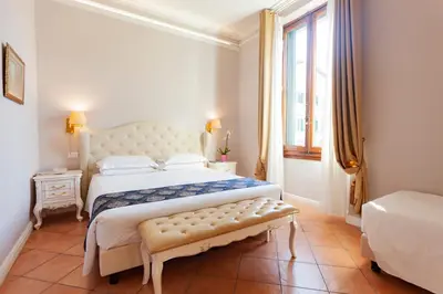 Letto o letti in una camera di Villa Royal