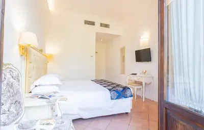 Letto o letti in una camera di Villa Royal