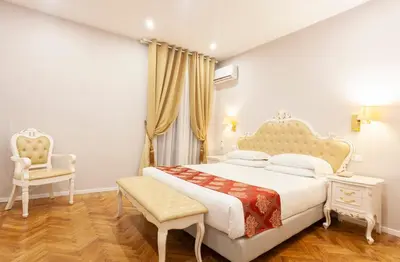 Letto o letti in una camera di Villa Royal