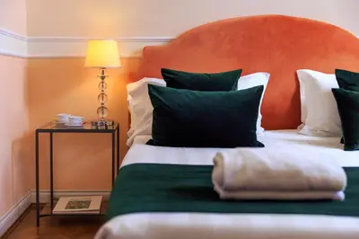 Letto o letti in una camera di Hotel Villa Carlotta