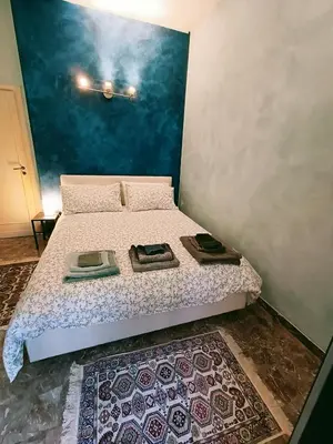 Letto o letti in una camera di Appartamento Aurora
