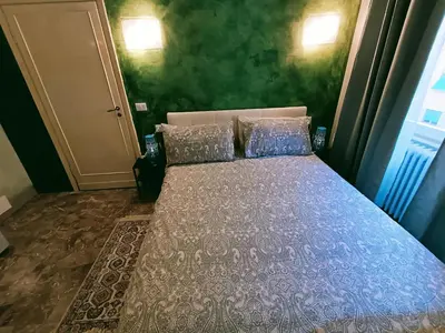 Letto o letti in una camera di Appartamento Aurora