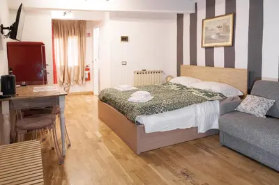 Letto o letti in una camera di Ognissanti Dream Suites