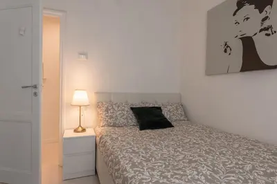 Letto o letti in una camera di Gallery Art Apartment in San Frediano
