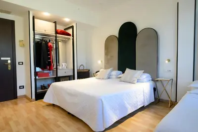 Letto o letti in una camera di Art Hotel Milano