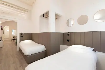 Letto o letti in una camera di Cestello Suite by Mmega
