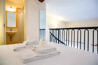 Letto o letti in una camera di Tranquil Suite Near David